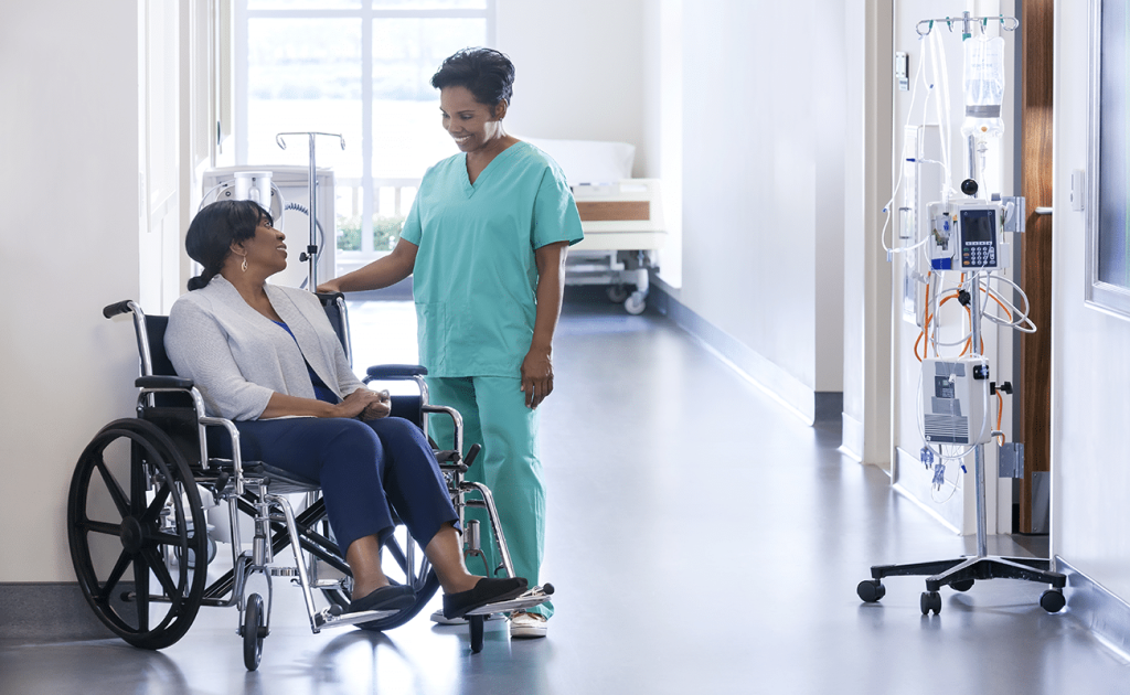 Nurse helping patient